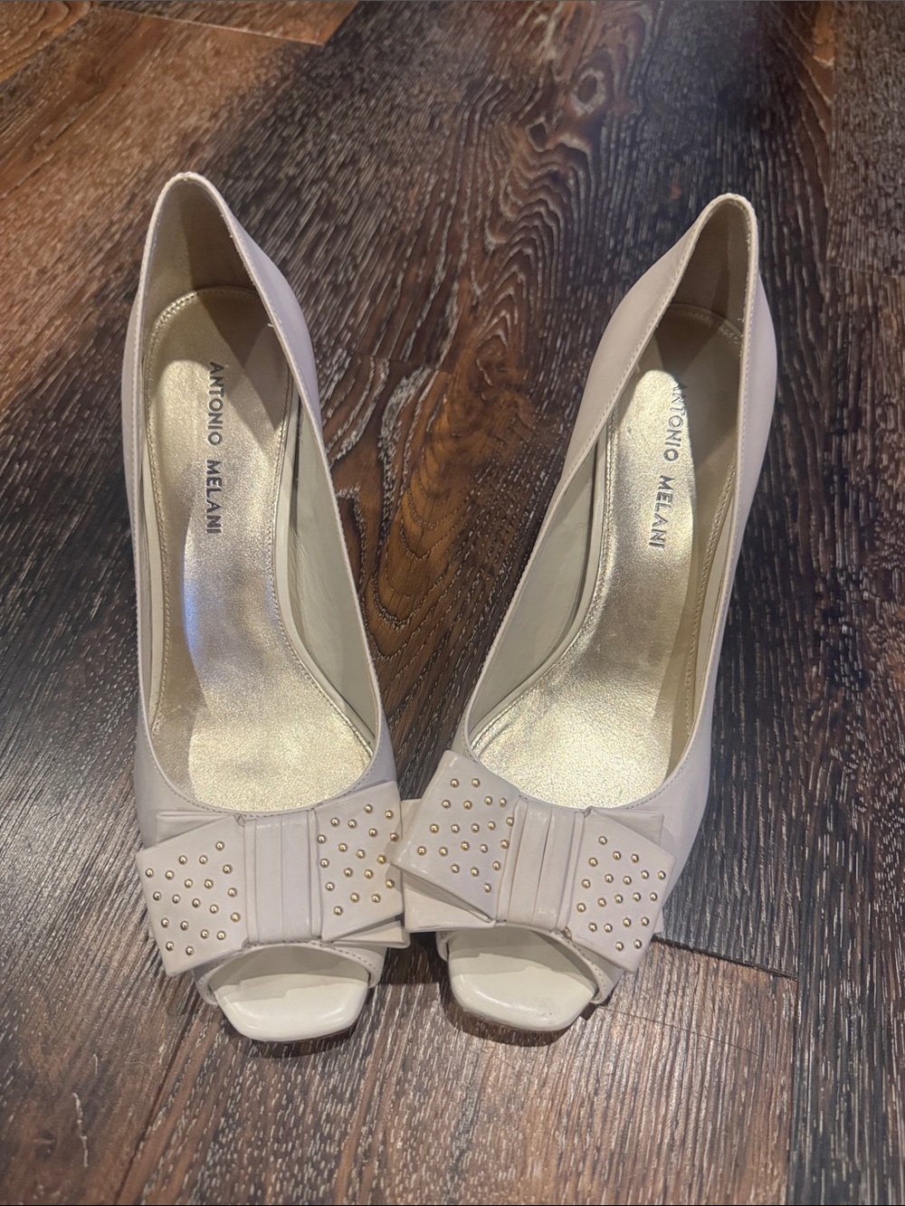 ANTONIO MELANI blush nude peep-toe bow pumps with studs